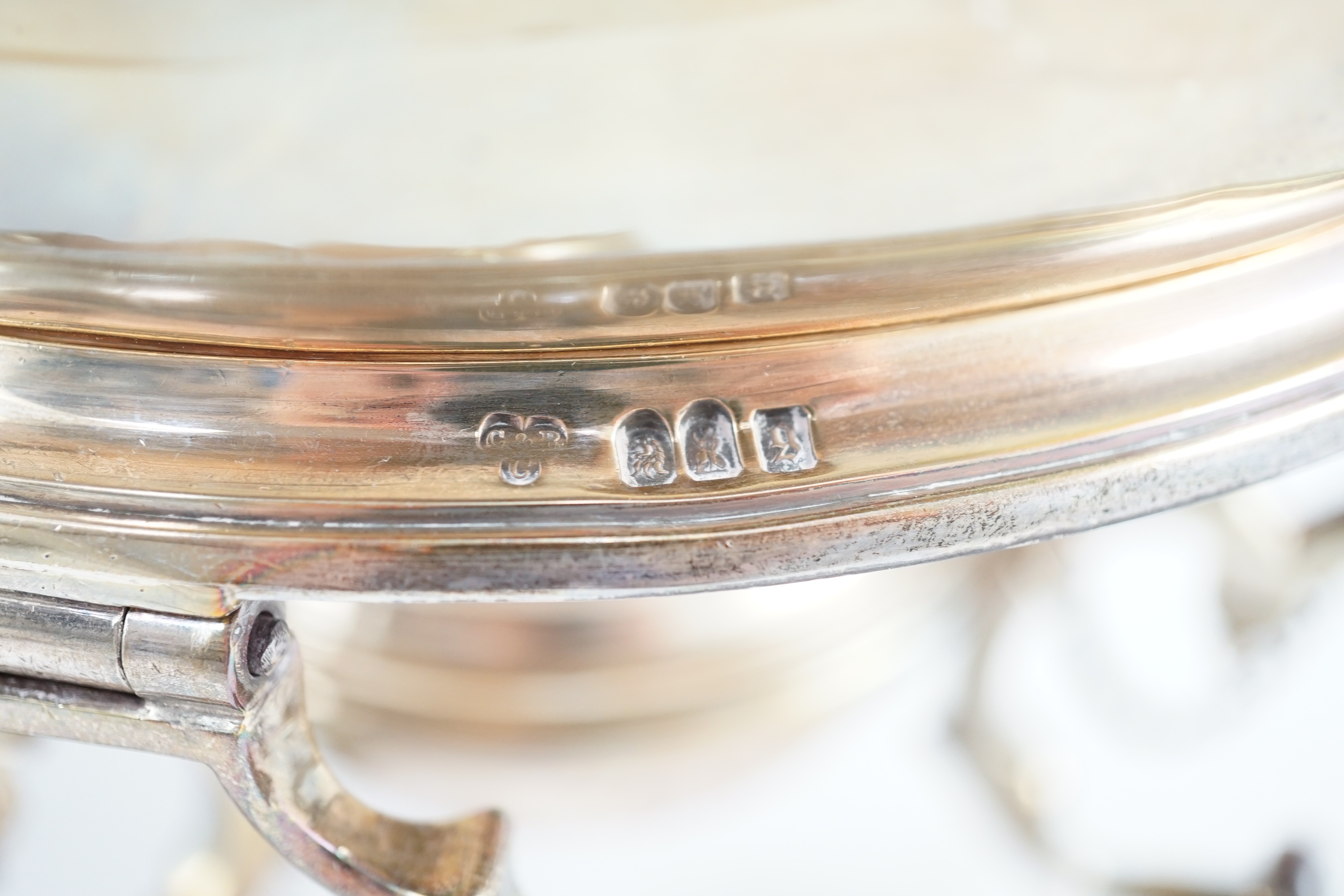 A large George V Britannia standard silver tea kettle on two handled stand, with burner, by Charles & Richard Comyns
